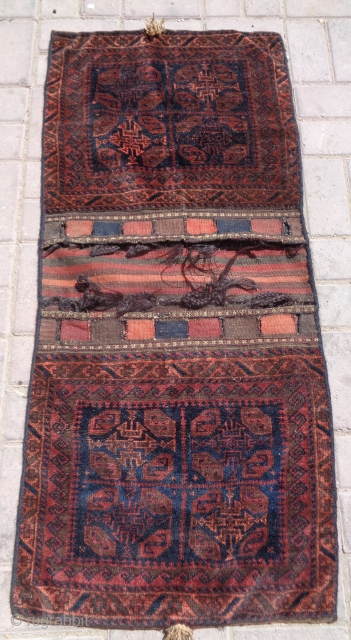 Baluch Khorjin with soft shiny wool and original Kilim backing,good colors design and condition,fine weave.Size 4'2"*1'10".E.mail for more info and pics.            