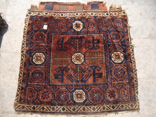 An early and very beautiful Baluch bagface with good colors and fine weave.Size 2'9"*2'9".E.mail for more info.                