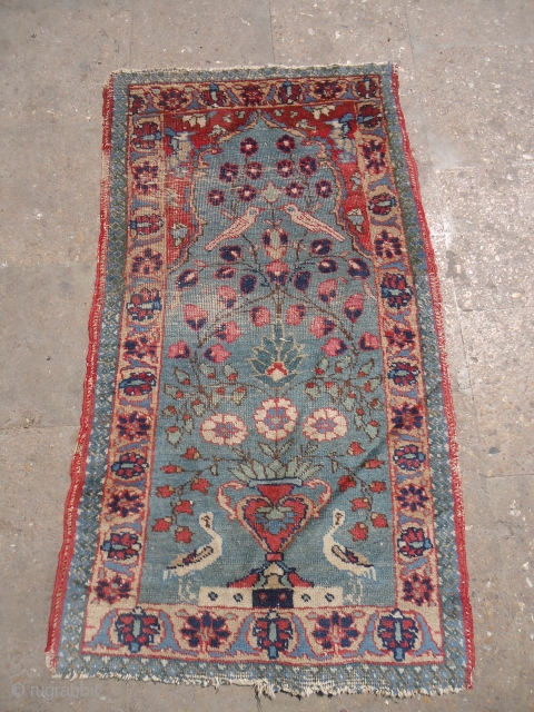 Small Heriz Rug with birds,beautiful design,early age and good colors,as found without any repair or work done.Size 3'10"*2'1".E.mail for more info and pics.          