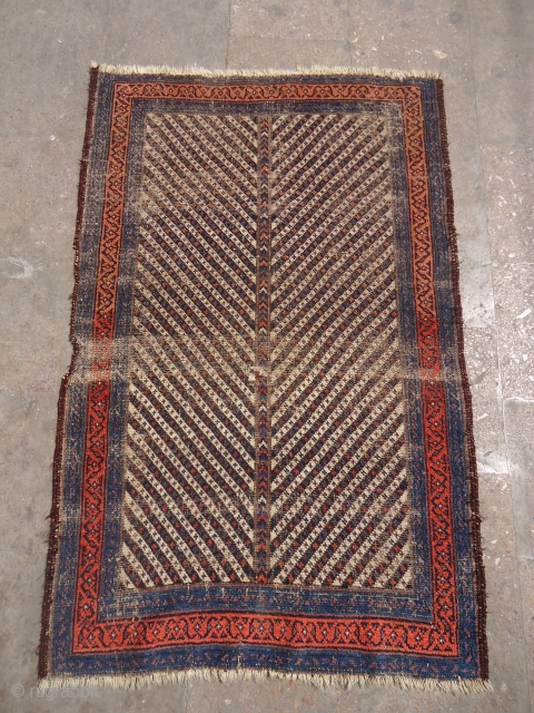 Beautiful Baluch Rug with condition issues,as found without any repair or work done.Size 4'3"*2'9".E.mail for more info and pics.              