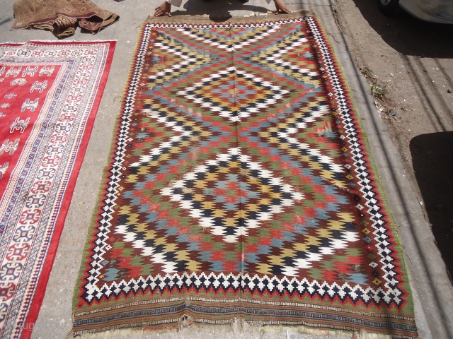 Antique Qashqai Kilim with Eye-Dazzler desigen,all good natrul colors,very fine weave,beautiful pce with good age,As found without any work done,Size 8'6"*5'3".E.mail for more info.         