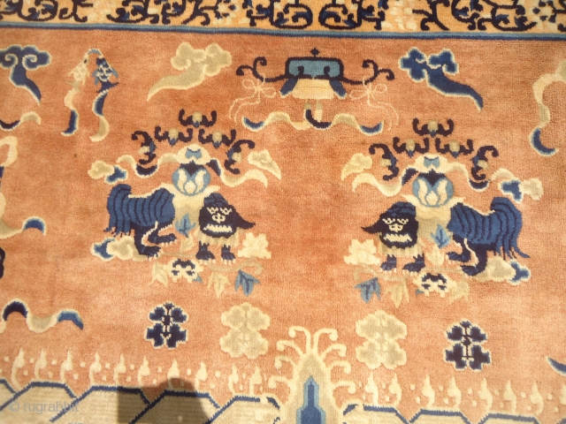 Tibet or Chinese seating rug with two dragons in the middle and beautiful design,fine weave,all good colors and fine weave.Good age,Size 5*3ft.E.mail for more info and pics.      