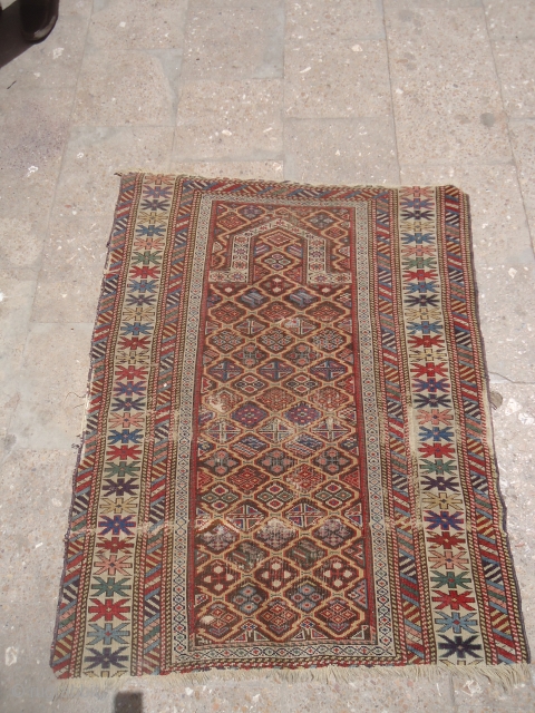 Caucasian Prayer Rug fragment with great colors and nice design,good weave and age ,as found.Size 3'9"*2'11".E.mail for more info and pics.            