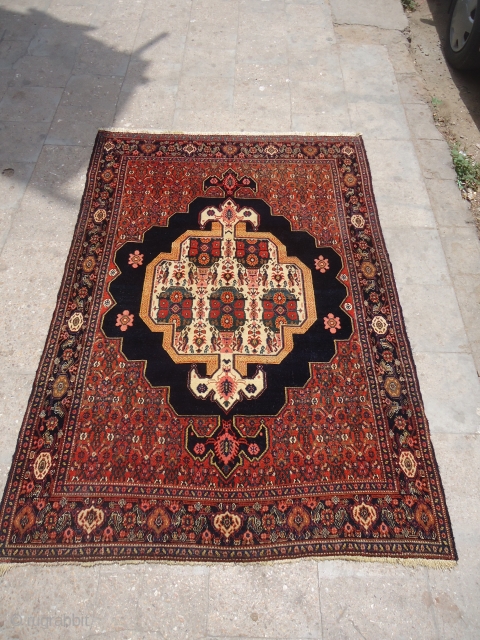 Very gorgeous, colorful, unique and finely woven Antique Senneh rug. All colors are good,weave is fine,condition is very good,unusual desigen.Size 6'4"*4'4".E.mail for more info.         