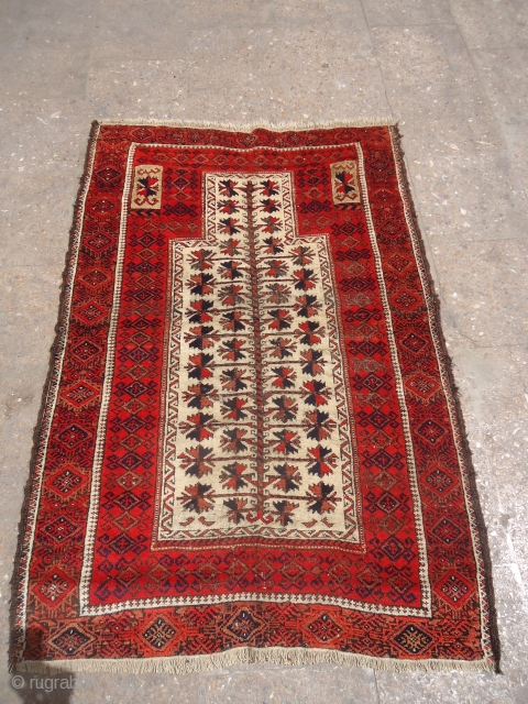 Ivory ground baluch prayer rug with great colors and nice design,all original without any work done.Size 4'4"*3ft.E.mail for more info and pics.           