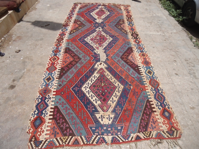 Large Colorful early Anatolian Kilim with some condition issues,great natural colors as found without any work done.Size 13'4"*5'6".E.mail for more info and pics.          