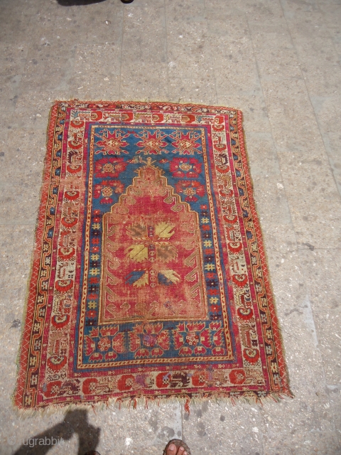 Early Anatolian Prayer Rug,fragmently condition,all natural colors,very nice design,As found.Size 5'5"*3'8".E.mail for more info and pics.                 