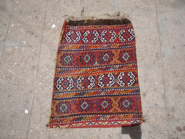 Juicey Anatolian Heybey or Grain Bag,with beautiful colors and fine weave,very nice desigen,good age,beautiful striped kilim backing.Size 2'8"*2'.E.mail for more info and pics.          