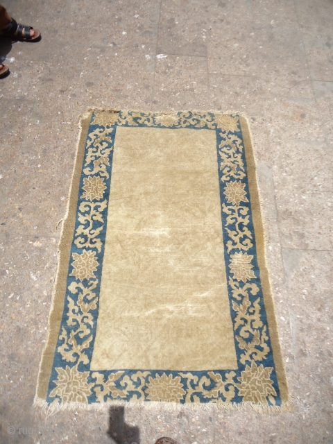 Chinese Rug with very early age,beautiful ivory ground.As found without any repair or work done.Size 4'10"*2'8".E.mail for more info and pics.            