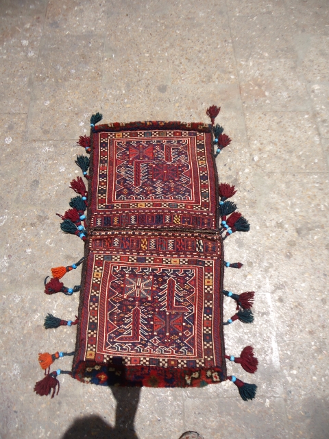 Luri Bakhtiyari saddlebag,original stripe kilim backing,all natural colors,fine weave,excellent condition,very nice design,sides ends are all original.Size 3'3"*1'7".E.mail for more info and pics.           