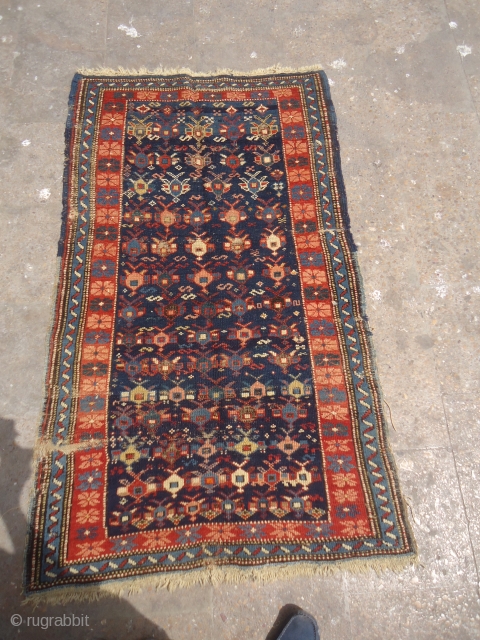 Caucasian Rug with great natural colors and age,as found without any repair or work done,beautiful design.Size 4'10"*2'10".E.mail for more info and pics.           