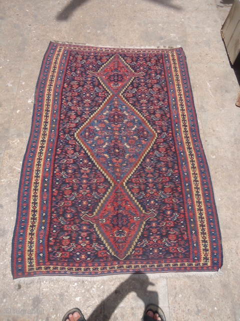 Beautiful Senneh Kilim with good colors and very nice design,good condition with old restorations done.Size 5*3'6".E,mail for more info and pics.            