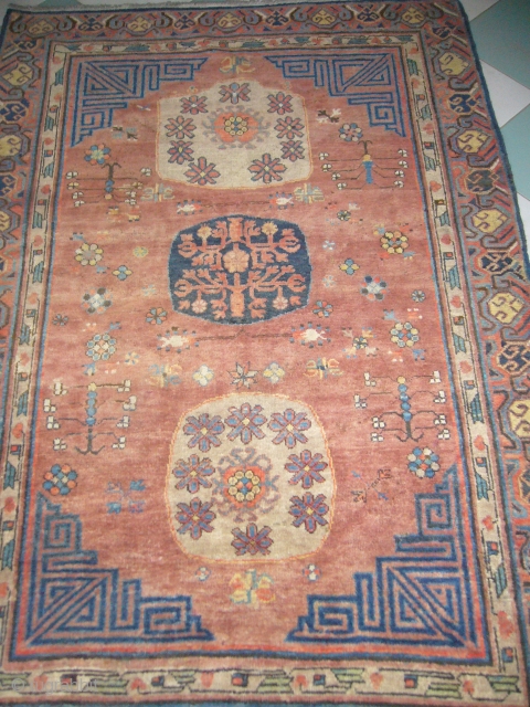 Khotan Rug,good condition and very nice colours,beautiful desigen,very supereb Rug,Hand washed Ready for display,E.mail for more info and pics.              