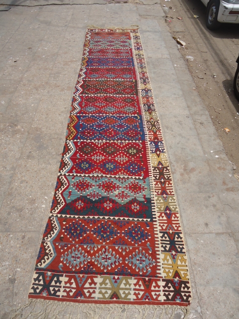Anatolian Kilim pannel with great natural colors and a beautiful desigen,very fine weave,Very attractive pce with great colors and beauty.Size 12'9"*2'10".E.mailf for more info and pics.
       