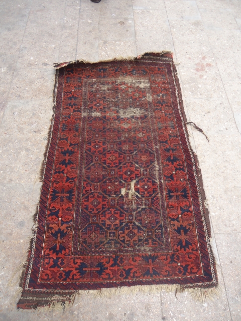 Finely woven Early baluch rug fragment with beautiful unsual border,both ends have little kilim endings,good colors and desigen.Size 5'3"*3".E.mail for more info and pics.         
