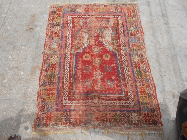 Early Anatolian Prayer Rug Fragment with beautiful colors and deisgen,good age.As found.E.mail for more info and pics.                