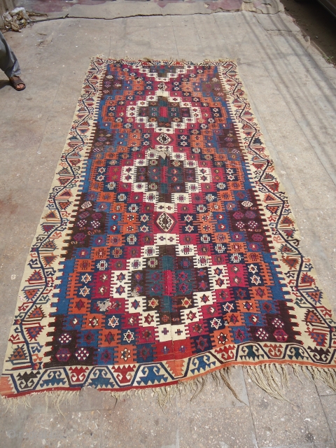 Anatolian Kilim with great natural colors and very fine weave,as found without any repair or woek done,beautiful desigen with stars,very nice borders.Size 10'10"*5'3".E.mail for more info and pics.     