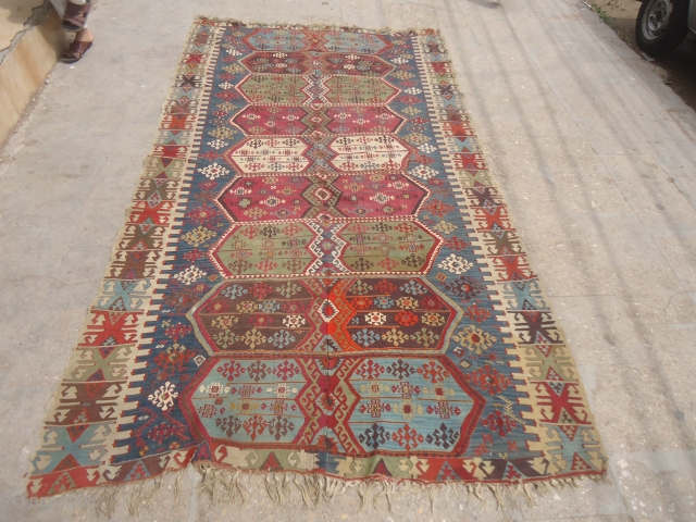 Anatolian Kilim with great natural colors and beautiful design,fine weave and and nice condition.Good age ,very beautiful pce.Size 10'1"*5'9".E.mail for more info and pics.         