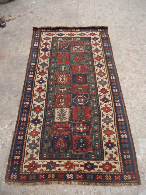 Caucasian Prayer Rug with unusual design,good colors and nice condition,beautiful design.Ready for the display or floor.Size 7*3'10".E.mail for more info.             