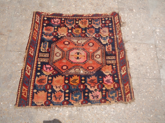 Shirvan Dated unusal design.As found without any repair or work done.Size 2'8"*2'7".E.mail for more info and pics.                