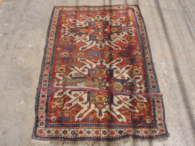 Chelabard Kazak Dated Fragment with great colors and wool,all great natural dyes.Early age.Size 6'8"*4'9".E.mail for more info and pics.              