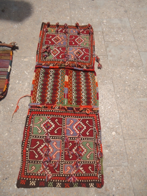 Anatolian Heybey with very nice design,Original Kilim backing and hooks,Tight weave,very nice pce with excellent condition.Size 4'8"*1'9".E.mail for more info and pics.           
