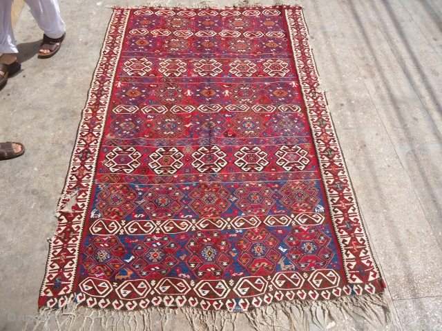 Anatolian Kurdish Kilim,very beautiful colors and desigen.Very nice motifs of mens and animals,all good colors,fine weave and without any work done.As found.E.mail for more info and pics.      