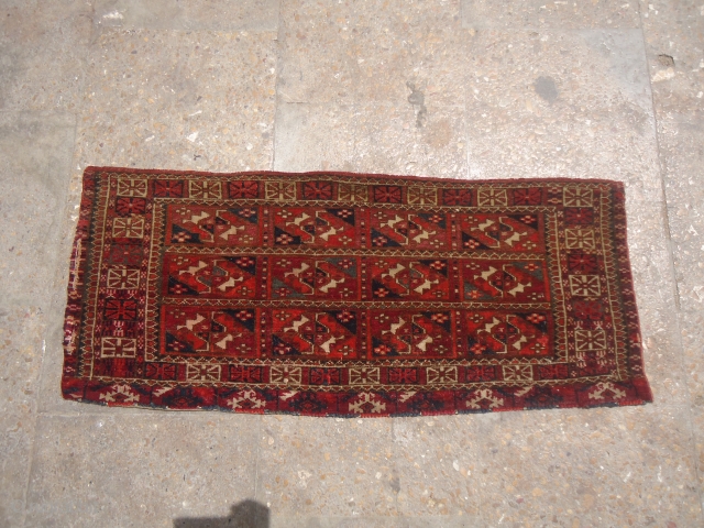 Tekke Trapping with all good colors and fine weave,all original,Very nice wool.Size 2'9"*1'2".E.mail for more info and pics.               