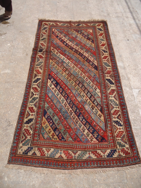 Beautiful caucasian rug with good colors design and age,old repairs done,E.mail for more info and pics.                 