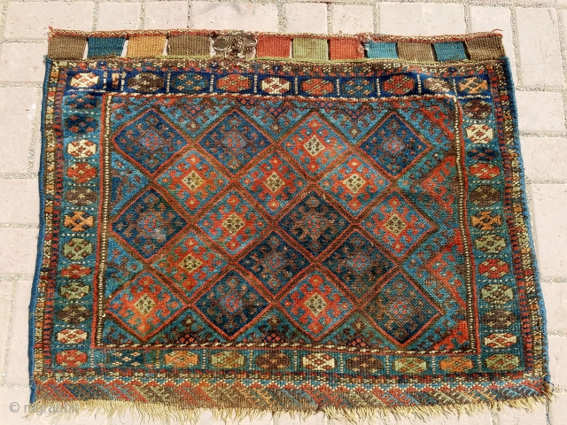 Colorful juicy Jaf bagface with both sides kilim endings,all good colors, soft shiny wool.Size 3'2*2'6".E.mail for more info and pics. 

            