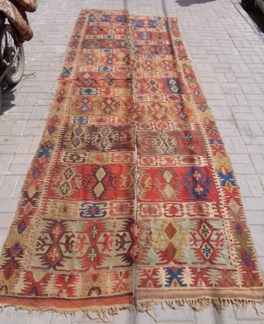 Anatlian Kilim with good colors and age,nice design,one part has been cut from center.E.mail for more info and pics.              