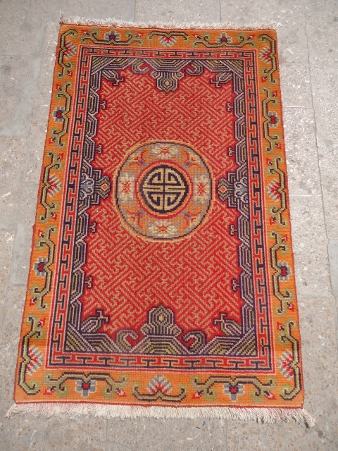 Tibet style Rug with beautiful colors and design,good condition.Size 4*2'6".E.mail for more info.                    