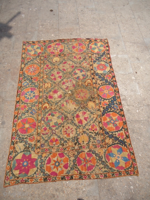 Early Suzani Frgament with beautiful colors and desigen.As found.Size 5'9"*3'10".E.mail for more info and pics.                  