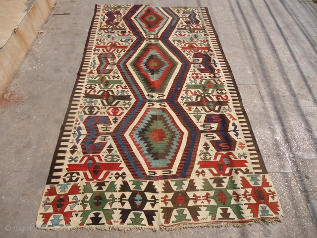 Anatolian Kilim Fragment with great natural colors and fine weave,very good condition without any repair or work done,good age and all natural colors,beautiful bold design.Size 9'4"*5ft.E.mail for more info and pics.  