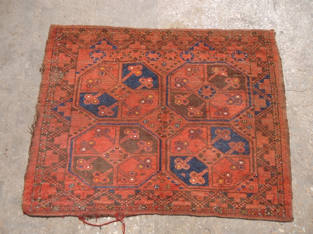 Unucentral asian square rug,nice natural colors and good age,condition issues,as found without any repair or work done.Size 3'8"*2'10".E.mail for more info and pics.          