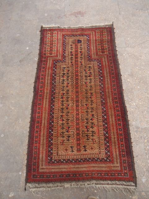 Camel ground Baluch Prayer Rug with great weave and dyes,both sides ends with kilim,very elegant design,excellent condition,all natural colors,very soft wool.Without any repair or work done.Size 4'11"*2'7".E.mail for more info and pics. 