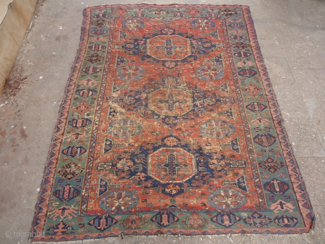 Soumac Kilim with unusual green border,very fine weave,great natural colors,without any repair all original.Size 7'1"*5'4".E.mail for more info and pics.             
