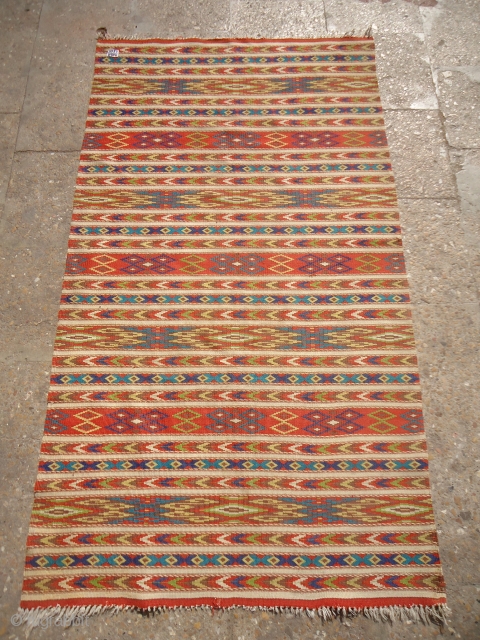 Dagestan Flatwoven kilim with beautiful colors and very fine weave,nice desigen and good condition.without any repair or work done.Size 5'*2'10".E.mail for more info and pcis.        