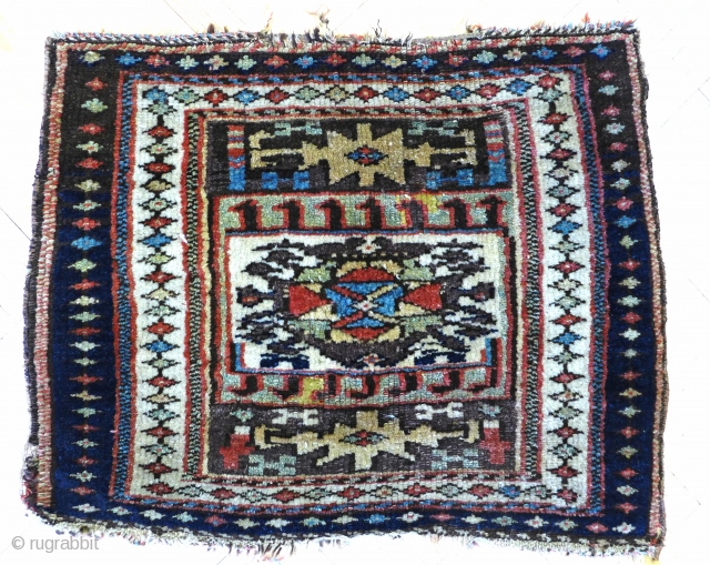 Great Kurd bagface with great colors and weave. It has has mostly a thick pile with a few small areas that are a little lower        