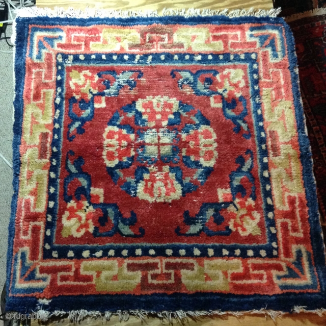 For sale is  a Tibetan, 2'2"x 2'2" early 20thCentury rug. Rug has good pile but with moth areas, some weft and warp breaks. Ends and sides are present. Cotton warp and  ...