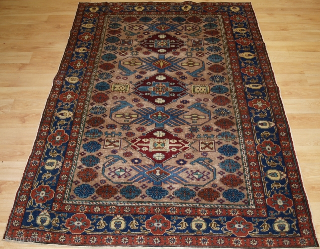 Antique Turkish Kayseri rug with traditional Caucasian 'Kuba' region design.
Circa 1920.
Size: 5ft 7in x 3ft 11in (170 x 120cm).
The rug has a classic Caucasian design on a very soft ground colour with  ...