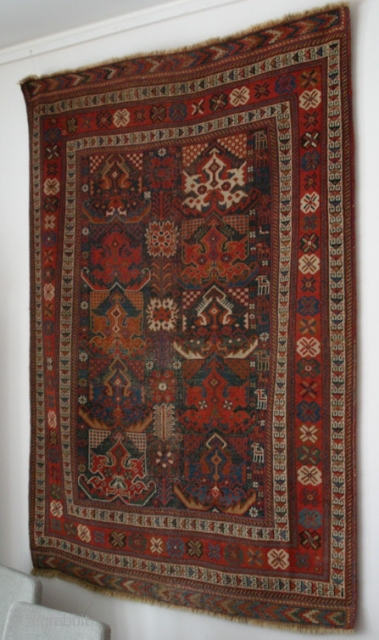 {85} 128 x 170 cm. Afshar, ca. 1870. Dragon palmettes.
Some wear/oxidation in main field. Ends and sides minimally conserved.
~ This piece was put up for sale for just $1150 on March 6,  ...