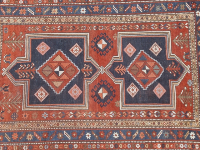 (8) Fachralo Kazak, 243 x 162 cm., ca. 1930, excellent condition, light even wear, saturated colors, some non-organic dyes used, no repairs, recently washed and fringes secured. A very appealing, semi-antique rug  ...