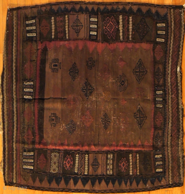Sofreh - Baluch, c. 1900. 4 x 4 ft (120 x 120 cm). This rug was used as a floor covering for meals, but is still in good condition.    
