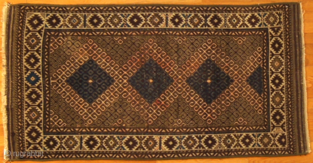 Persian Baluch, c.1900. 3 x 4½ ft (900 x 1350 cm), fair condition.                    