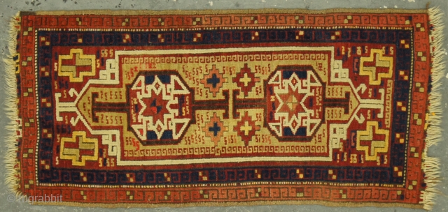 1.5 x 3.5 Caucasian Kazakh, c. 1900.  1½ x 3½ ft (45 x 105 cm), some fraying on ends.
             