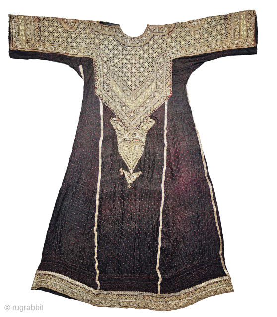 Aabha - wedding dress - Long tunic.
Having Real silver gold plated (zari) Mughlai (zardosi) embroidery on Gajji-Silk with Bandhani work (Tie and Dye),
Worn by the Memon muslim trader community of Abdasa region ...