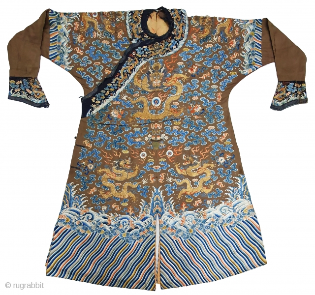 A very large and Beautiful Imperial Chinese dragon robe. Kesi woven with 9 dragons in pursuit of pearls among multicolour silk clouds, bats, and daoist symbols above wave and rock band. 19th  ...