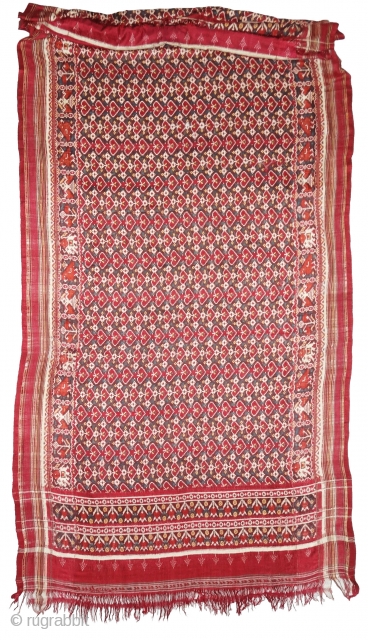 Patola Dupatta,Silk Double Ikat. Probably Patan Gujarat.India.This Patola Uses one of the most Rarely found designs.That of the Pipal leaf,known as Pan Bhat. This Rarely repeating pattern is combined with borders of  ...