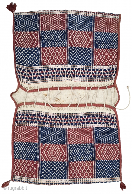 Donkey Saddle bag,A bound weaving of thick Hand Woven cotton with Natural Dyes.Having the Raw of Human Figures motif.
Used as a salt sack,
From Saurashtra, Gujarat, India.
C.1875-1900.
Its size is 75cmX120cm(20220215_162334).     